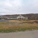 sacredgroundhospicehouse.com