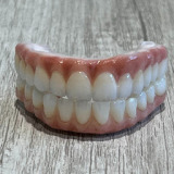 lrdenturesandimplants.com